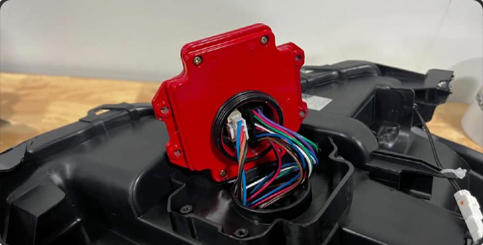 2016–2023 Tacoma Morimoto Evo Headlight Installation Guide 24 Connect the optional replacement driver securely.