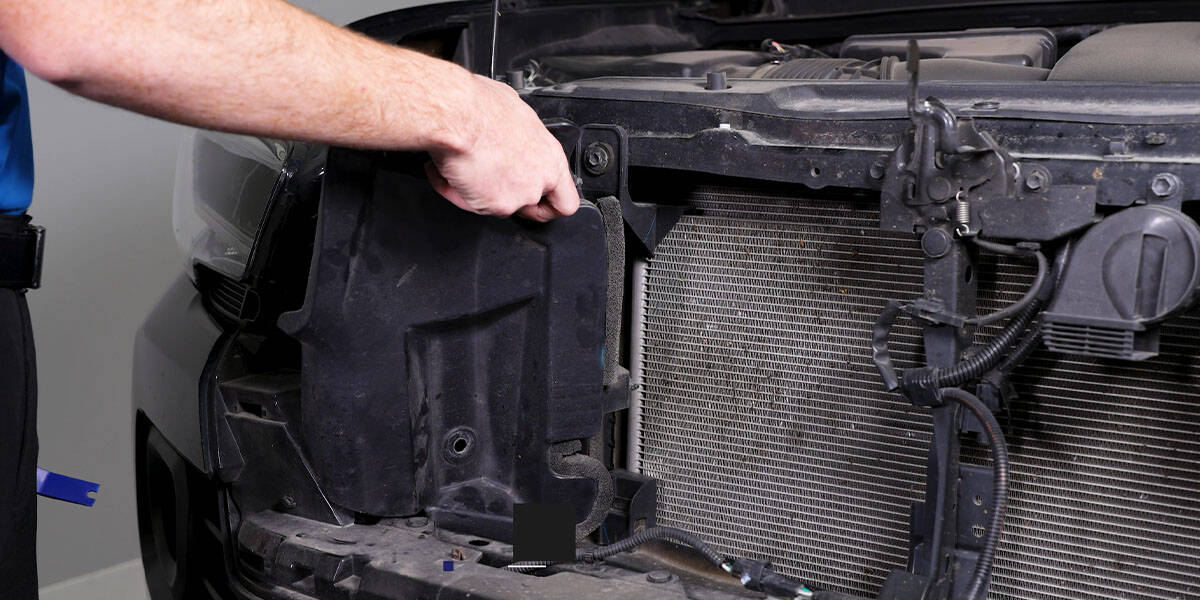 2016–2023 Tacoma Form Headlight Installation Guide 3 Remove the air deflector on each side.