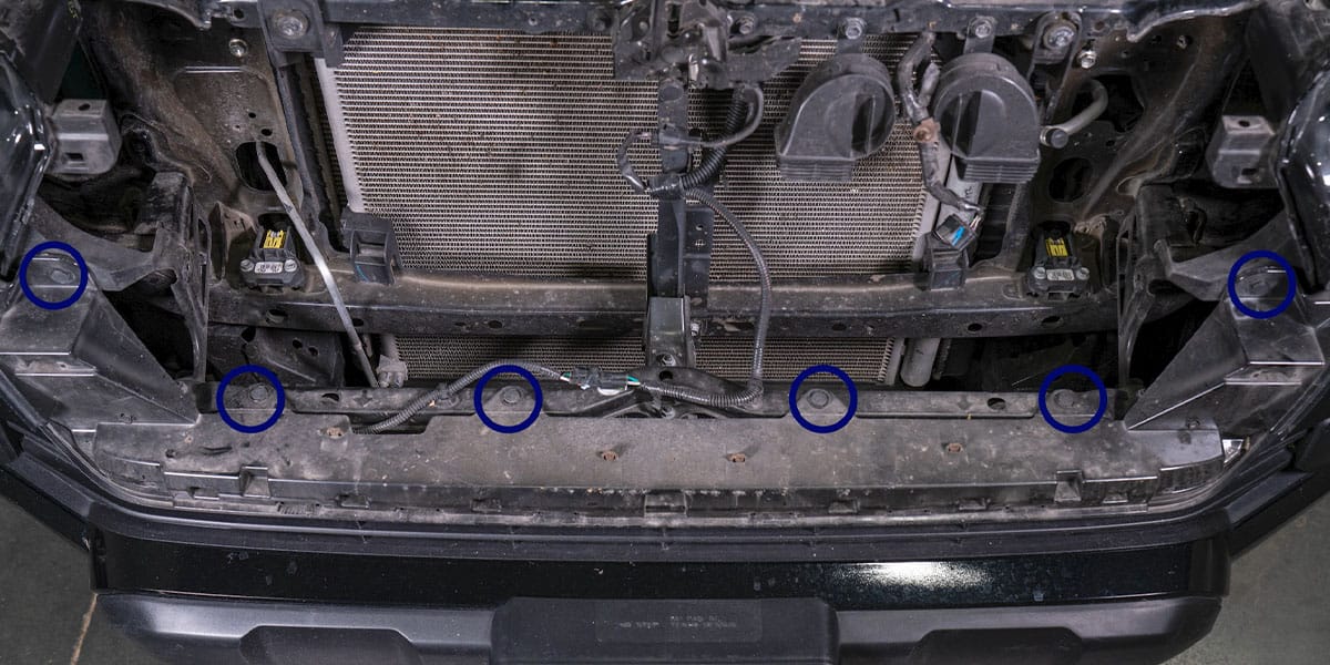 2016–2023 Tacoma Form Headlight Installation Guide 4 The manufacturer marks the six bumper-cover clips.