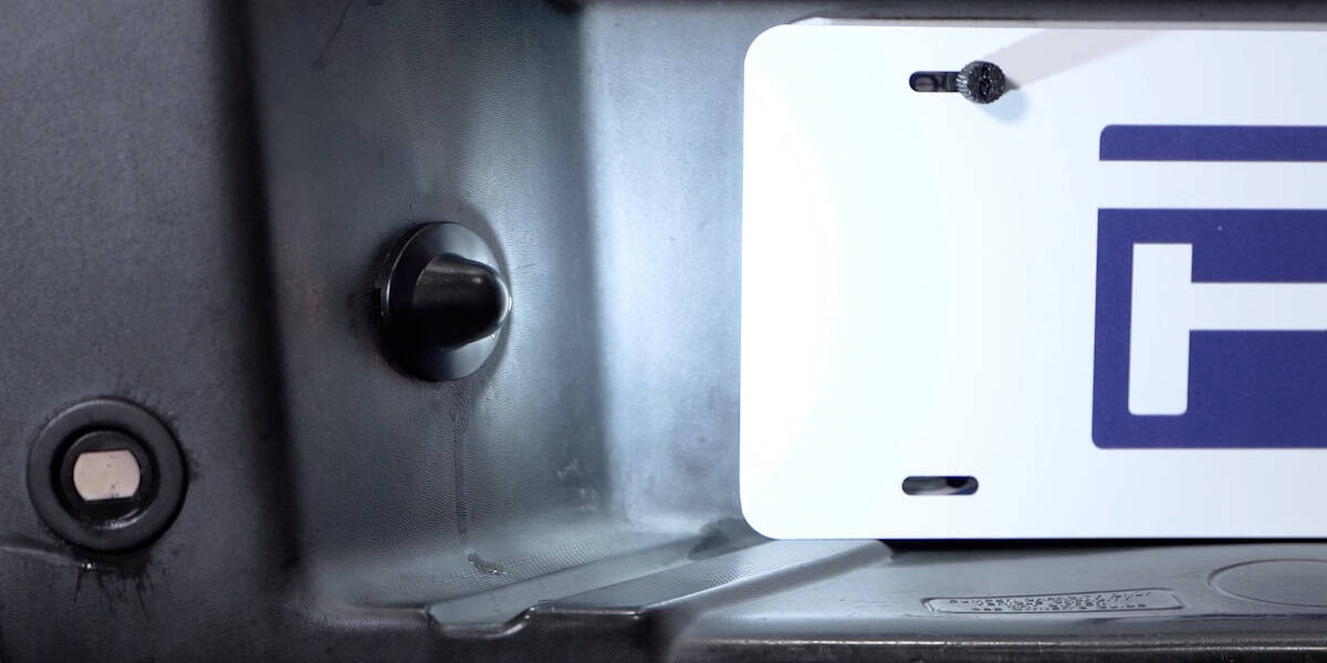 Install Form License-Plate Lights On Your Tacoma 6 Replacement lamp seated and illuminated.