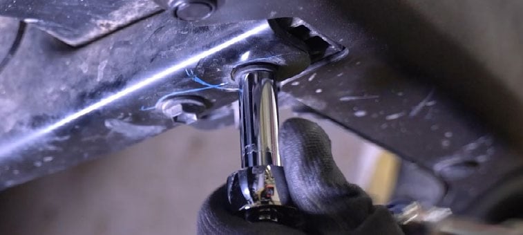 2016–2023 Toyota Tacoma Reverse Light Installation Guide 1 Remove the original underside bumper bolt.
