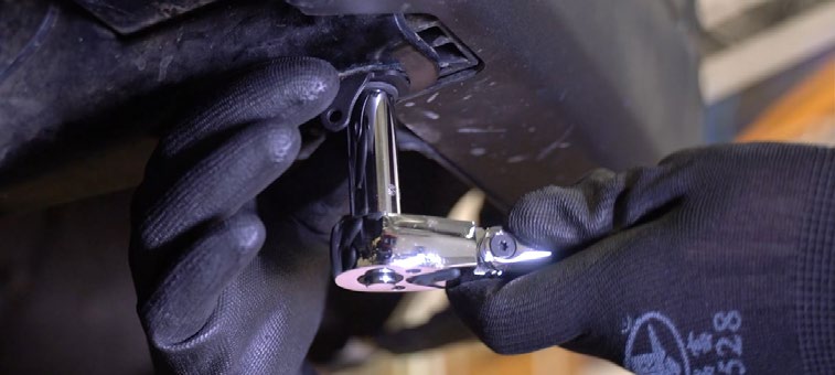 2016–2023 Toyota Tacoma Reverse Light Installation Guide 2 The universal bracket reuses the factory bumper bolt.