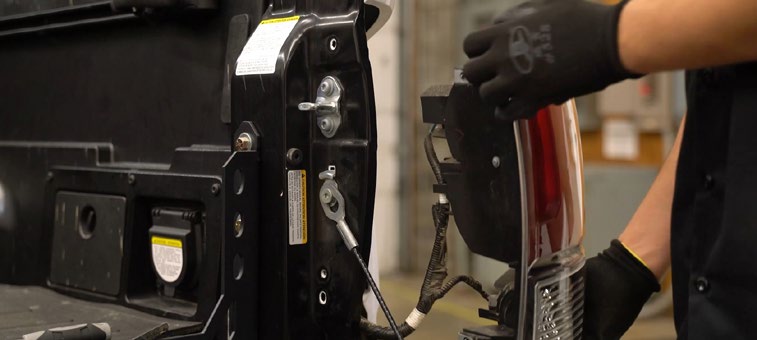 2016–2023 Toyota Tacoma Reverse Light Installation Guide 5 Remove the housing without pulling on its wiring.