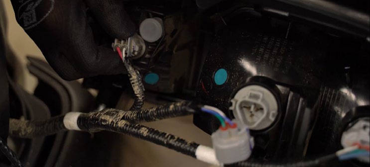 2016–2023 Toyota Tacoma Reverse Light Installation Guide 6 The two lower taillight connectors used by the adapter.