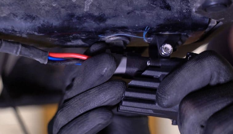 2016–2023 Toyota Tacoma Reverse Light Installation Guide 11 Remove the unused universal section and use the Tacoma adapter connection.
