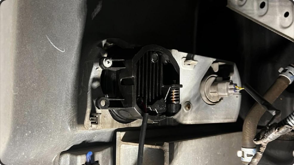Morimoto Type T Evo Fog-Light Installation And Aiming Guide 7 Position the replacement lamp and refit the mounting hardware.