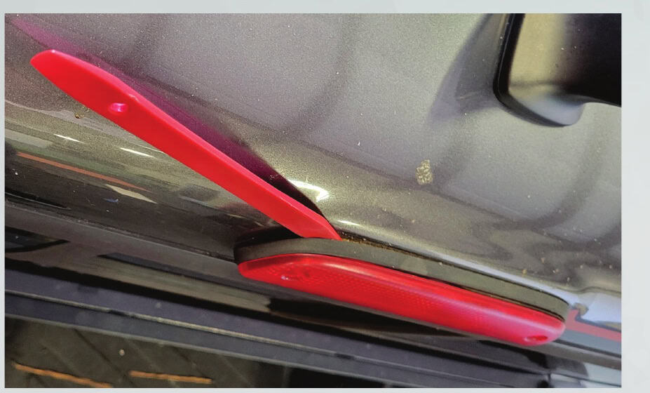 Toyota Tacoma Morimoto X3B Third Brake-Light Installation Guide 4 Work a trim tool carefully around the lamp to release the foam seal.