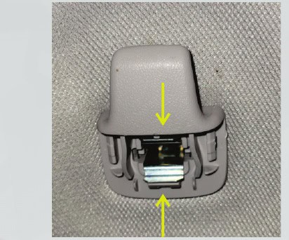 Toyota Tacoma Morimoto X3B Third Brake-Light Installation Guide 10 Depress the inner metal clip and withdraw the hanger.