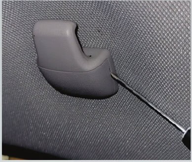 Toyota Tacoma Morimoto X3B Third Brake-Light Installation Guide 8 Open the hanger access covers with a thin trim tool.