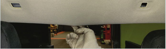 Toyota Tacoma Morimoto X3B Third Brake-Light Installation Guide 12 Lower the rear edge of the headliner only enough to reach the lamp fasteners.
