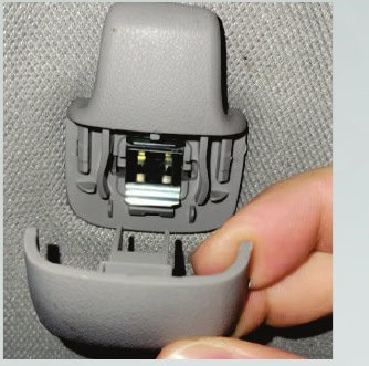 Toyota Tacoma Morimoto X3B Third Brake-Light Installation Guide 9 The metal retaining clip is visible behind the open cover.