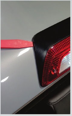 Toyota Tacoma Morimoto X3B Third Brake-Light Installation Guide 15 Gently release the lamp’s foam seal from the cab.