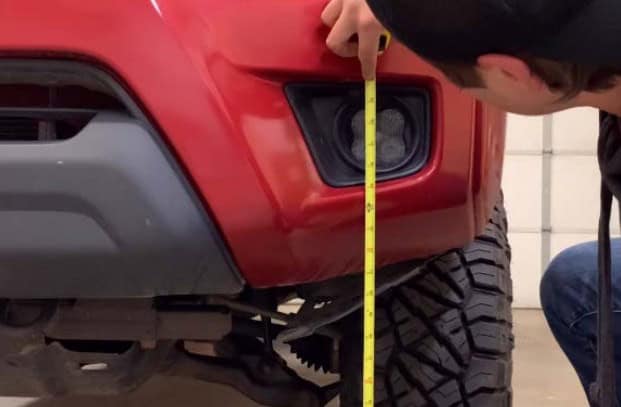 2016–2023 Toyota Tacoma Ss3 Fog Light Installation Guide 5 Manufacturer example: measuring the fog-lamp mounting height.