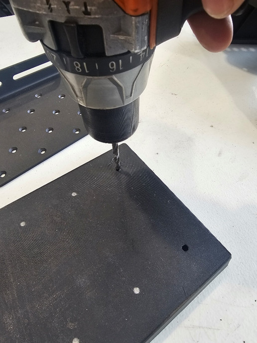 Universal Stand-Off D-Switch Hub Mounting Guide 2 Original manufacturer photograph: drill the marked surface with a 7/32-inch bit.