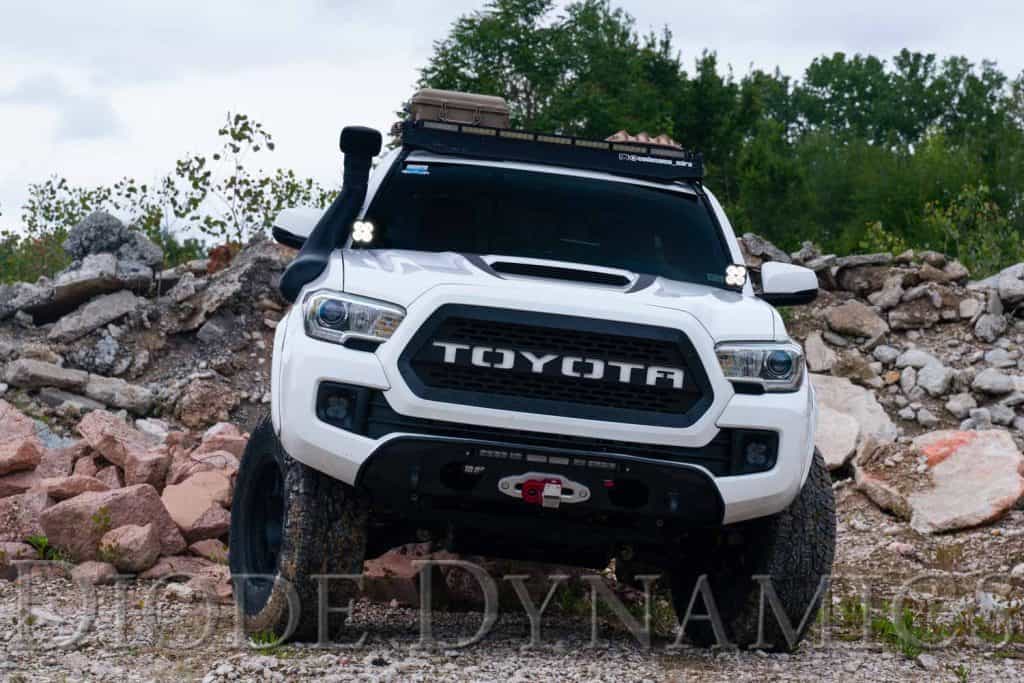 Diode Dynamics Ss3 Led Ditch Light Kit For 2016-2023 Toyota Tacoma 139 SS3 ditch lights shown illuminated on the Tacoma.
